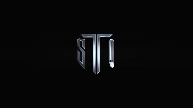 Металлический знак TSD со светлыми бликами на чёрном фоне — ИЗДИДЖИТЛ